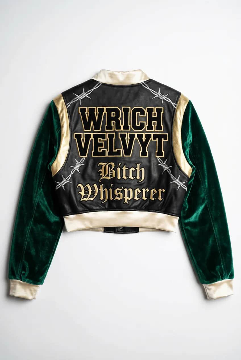 Bitch Whisperer velvet bomber — emerald sleeves, gold trim, barbwire embroidery. Limited run.